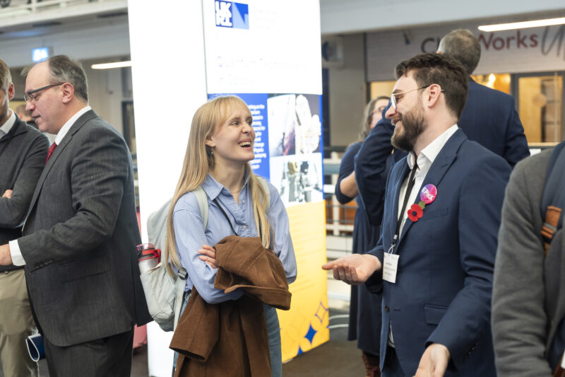 People chatting at a professional networking event.